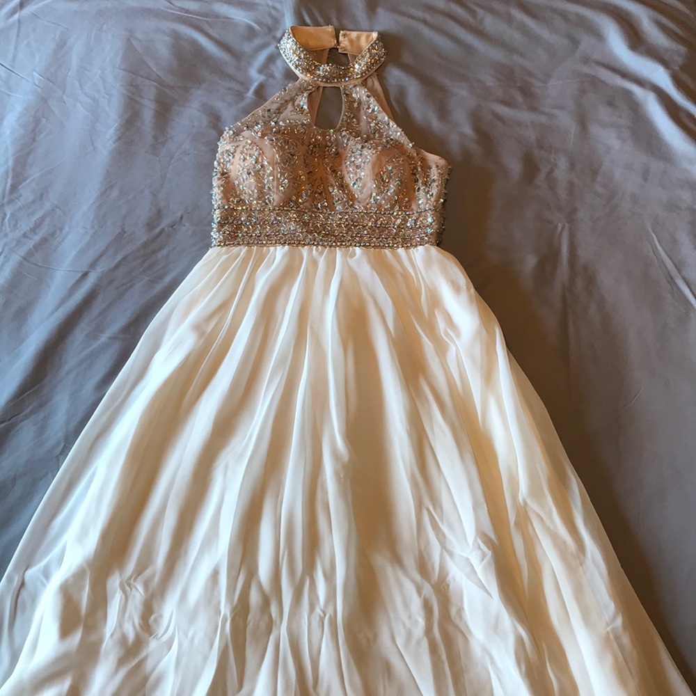 Long white and gold sequined prom dress